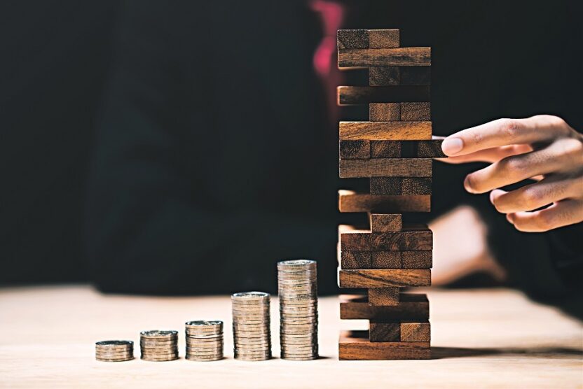 Adobe Stock 584115957 finance mgt jenga WEB