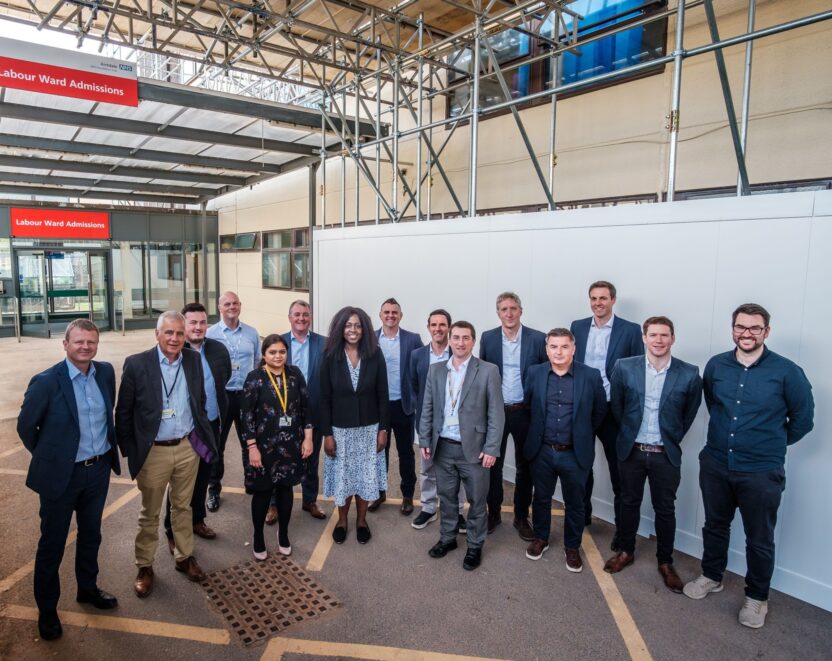 Photo shows members of the design team with Trust management 2048x1628